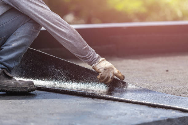 Professional Basement Waterproofing technician working in Phoenix, MD